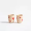 5dff8db885f69bfbff73fb97adbc96d03ea7bd2844a476c580b6b08f2be20c60 Tasse en grès - Cozy hearts - Édition limitée