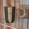 FE7E1A44-0C2E-4E19-BCA7-64D3E63F1B5D Mug - Manon XL